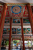 Vientiane, Laos - Pha That Luang, among the Other structures on the ground there is an open sala decorated with brightly colored paintings.  